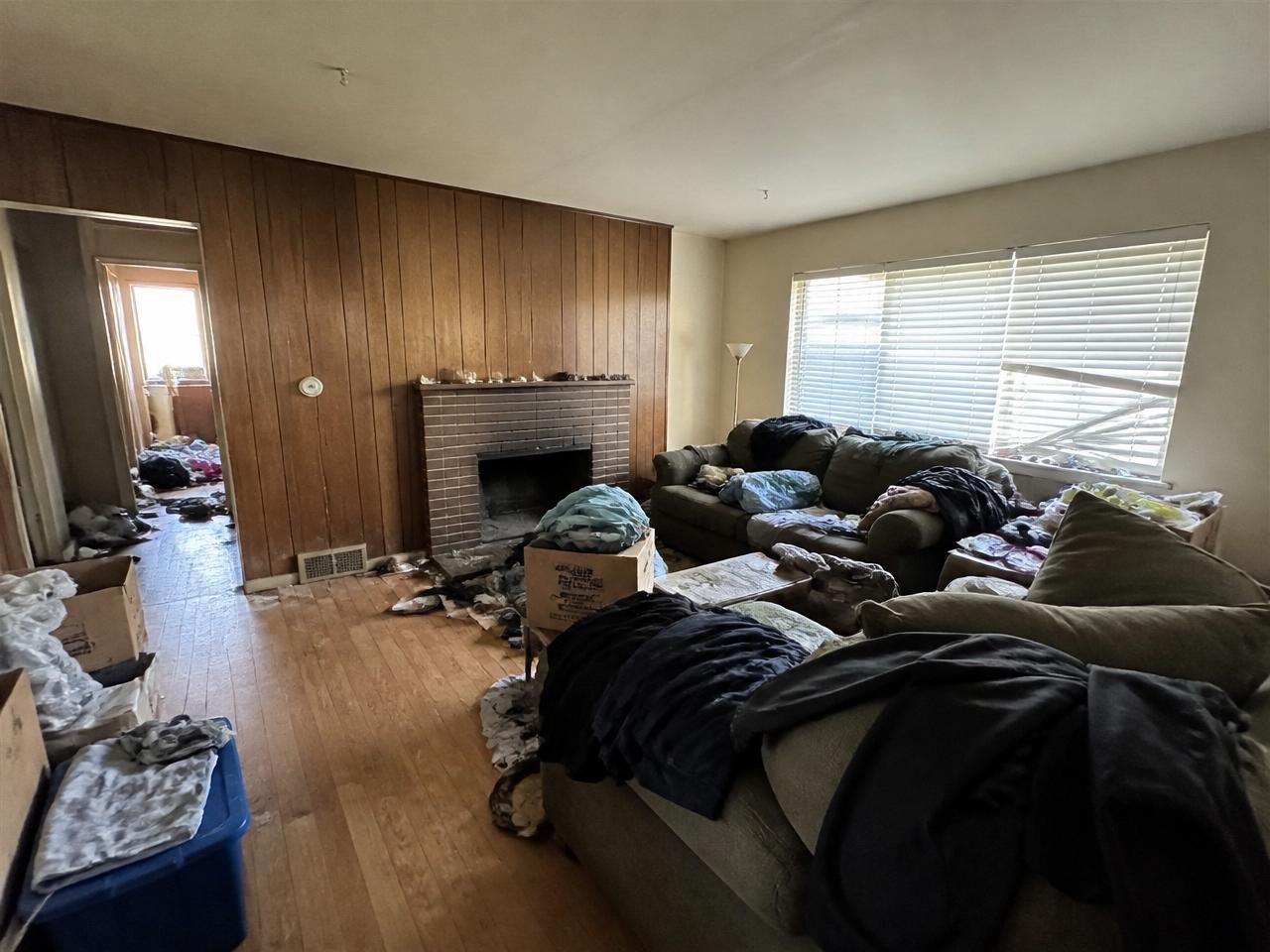 Cluttered distressed Bay Area home interior before DPI cleanout